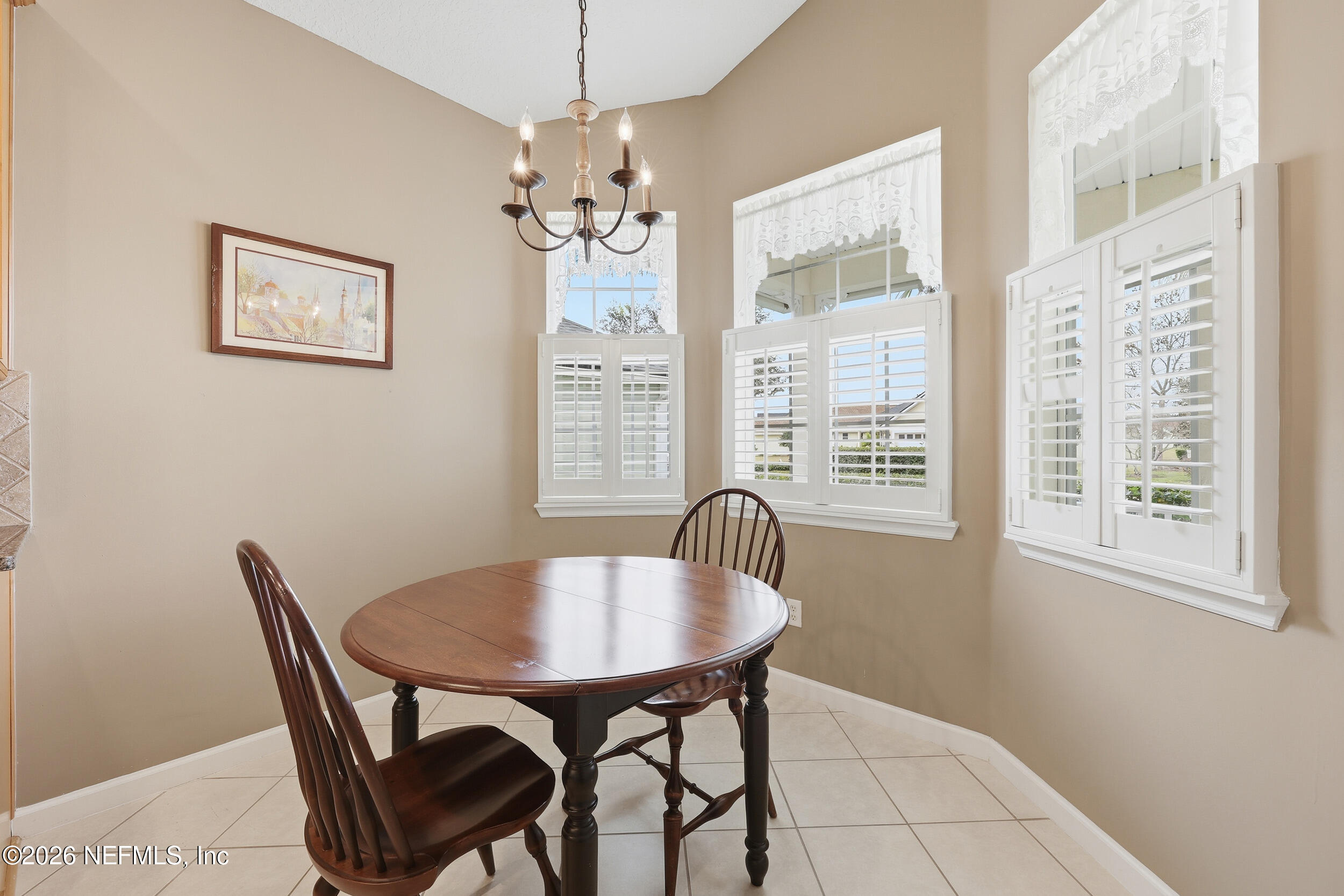 720 Copperhead Circle St. Augustine, FL 32092 - Photo 12 of 65 a view of a dining room with furniture window and outside view