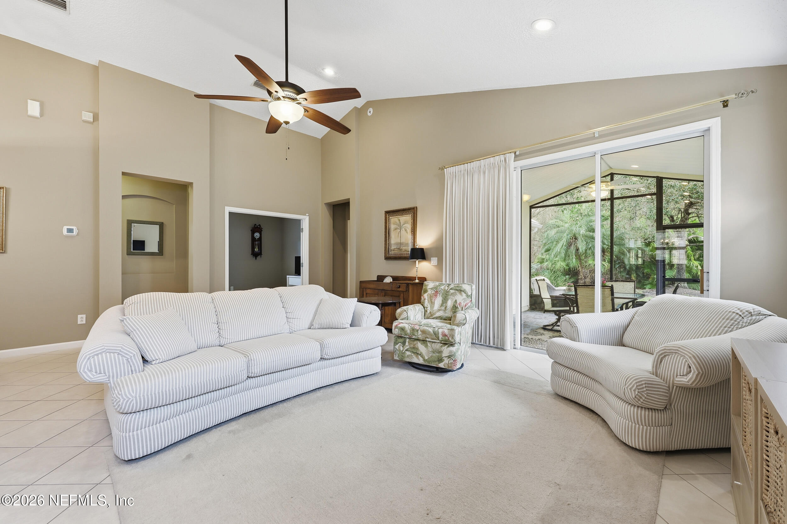720 Copperhead Circle St. Augustine, FL 32092 - Photo 15 of 65 a living room with furniture and a large window