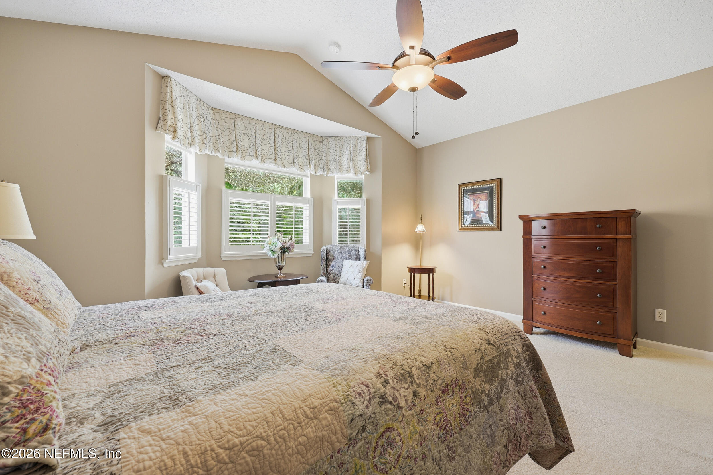 720 Copperhead Circle St. Augustine, FL 32092 - Photo 20 of 65 a bedroom with a bed dresser and a window
