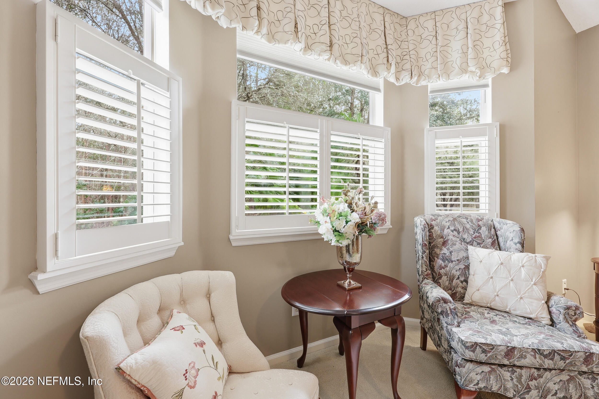 720 Copperhead Circle St. Augustine, FL 32092 - Photo 21 of 65 a living room with furniture and a window