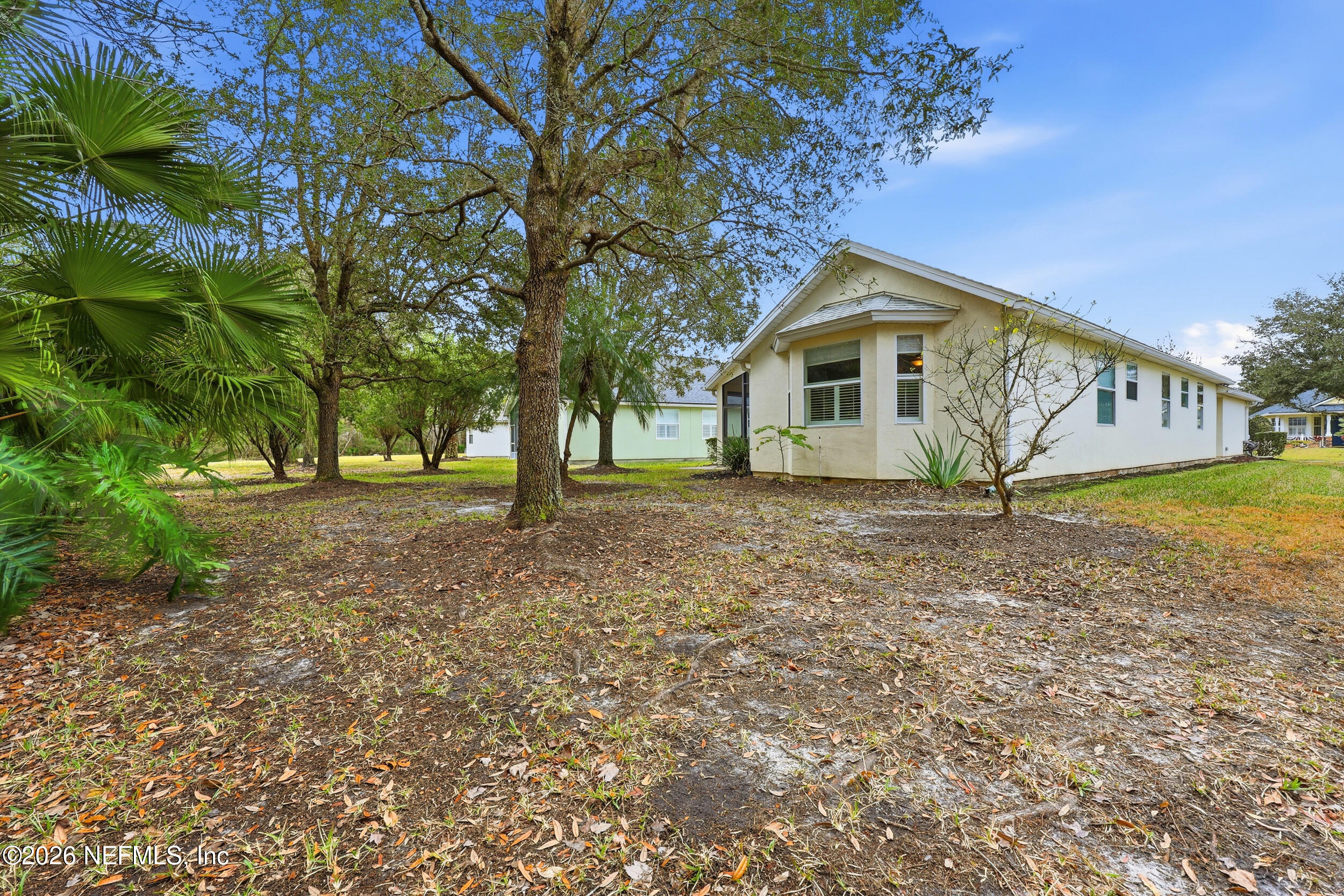 720 Copperhead Circle St. Augustine, FL 32092 - Photo 36 of 65 a view of a house with a yard