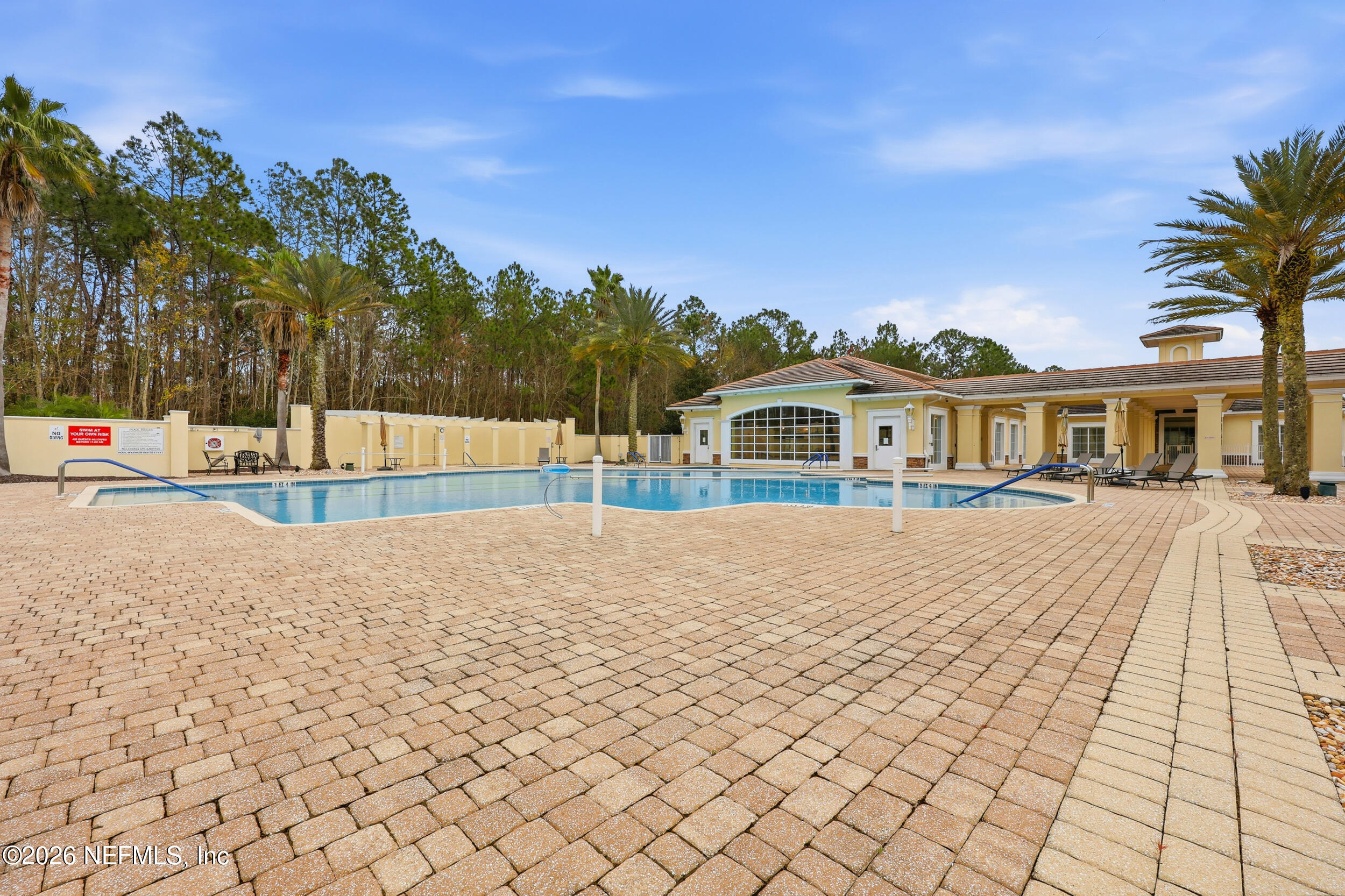 720 Copperhead Circle St. Augustine, FL 32092 - Photo 57 of 65 a view of a house with a swimming pool