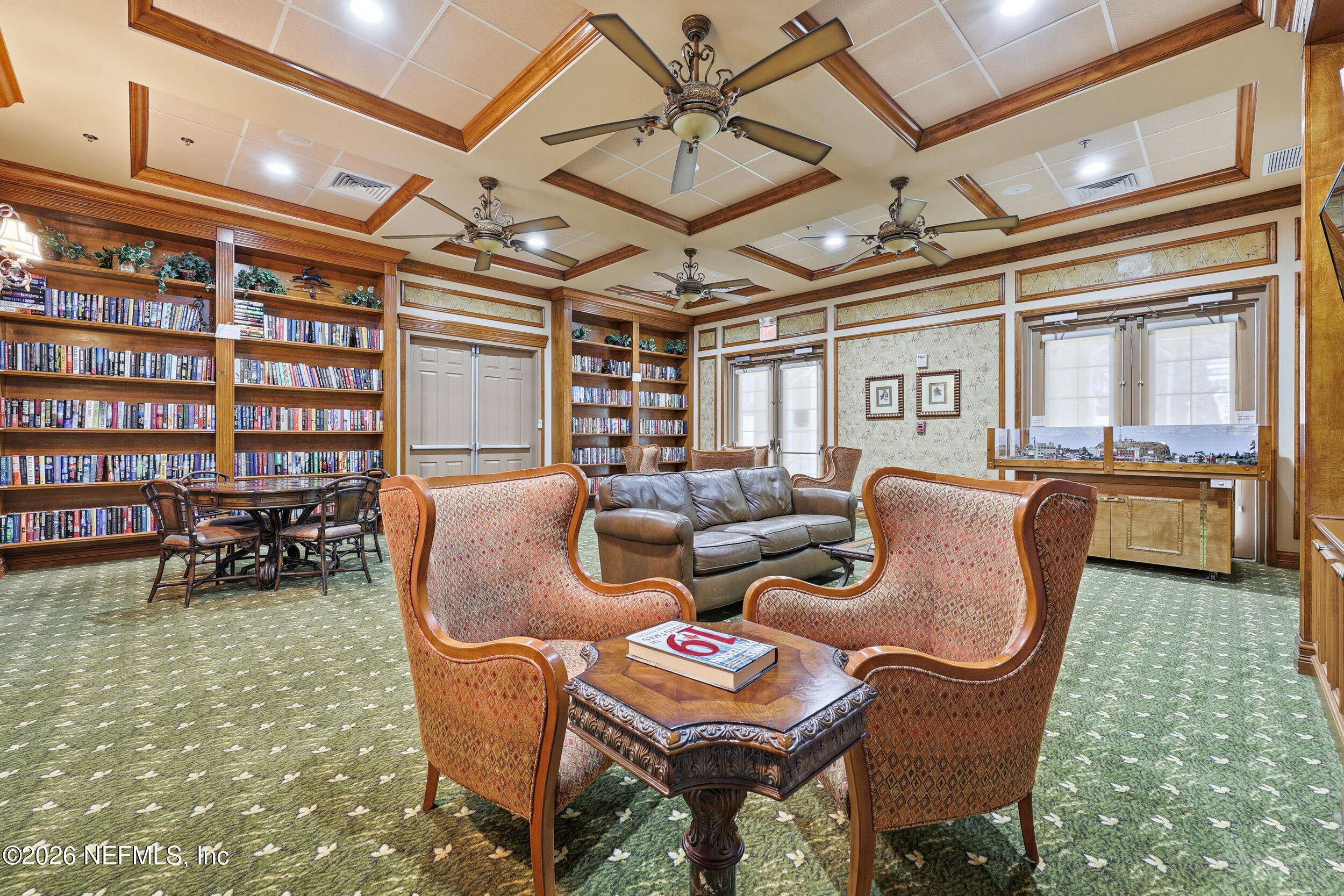 720 Copperhead Circle St. Augustine, FL 32092 - Photo 59 of 65 a living room with furniture a ceiling fan and a rug