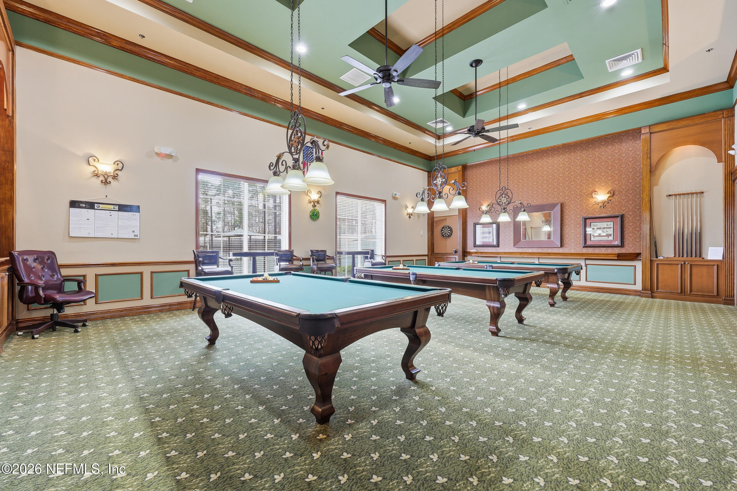 720 Copperhead Circle St. Augustine, FL 32092 - Photo 60 of 65 a room with lots of furniture and windows