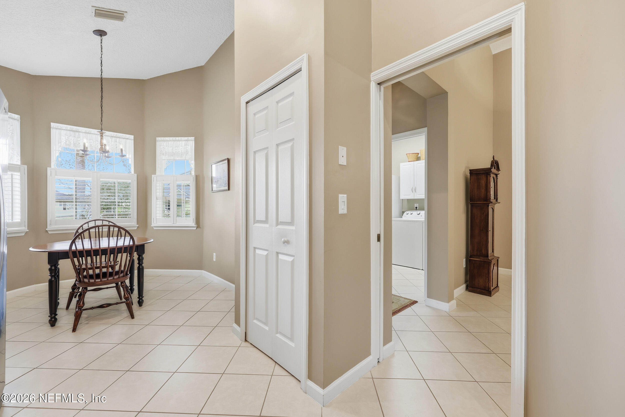720 Copperhead Circle St. Augustine, FL 32092 - Photo 10 of 65 a view of a livingroom with furniture and windows
