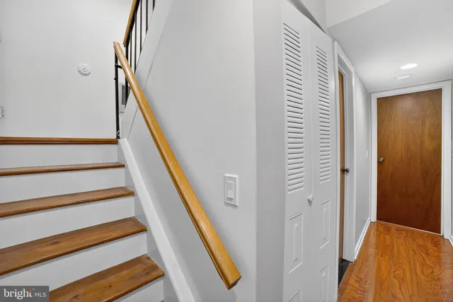 a bathroom with a sink toilet and mirror