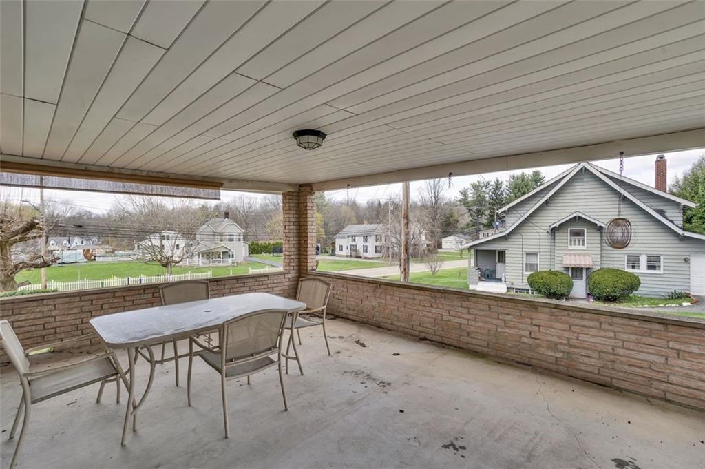 613 Portersville Road Ellwood City, PA 16117 - Photo 21 of 23 This large patio will hold many chairs or several patio sets.