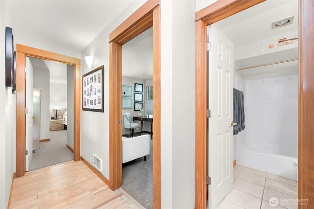 a view of a bathroom from the hallway