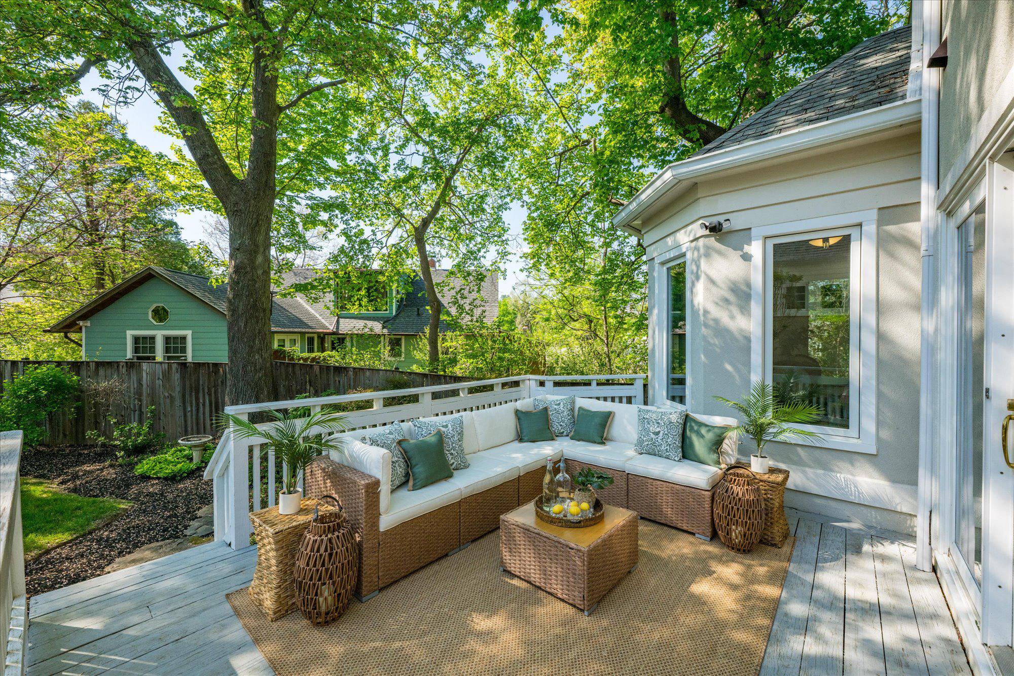 4332 Sangamore Road Bethesda, MD 20816 - Photo 2 of 28 Serene outdoor patio retreat in lush greenery.