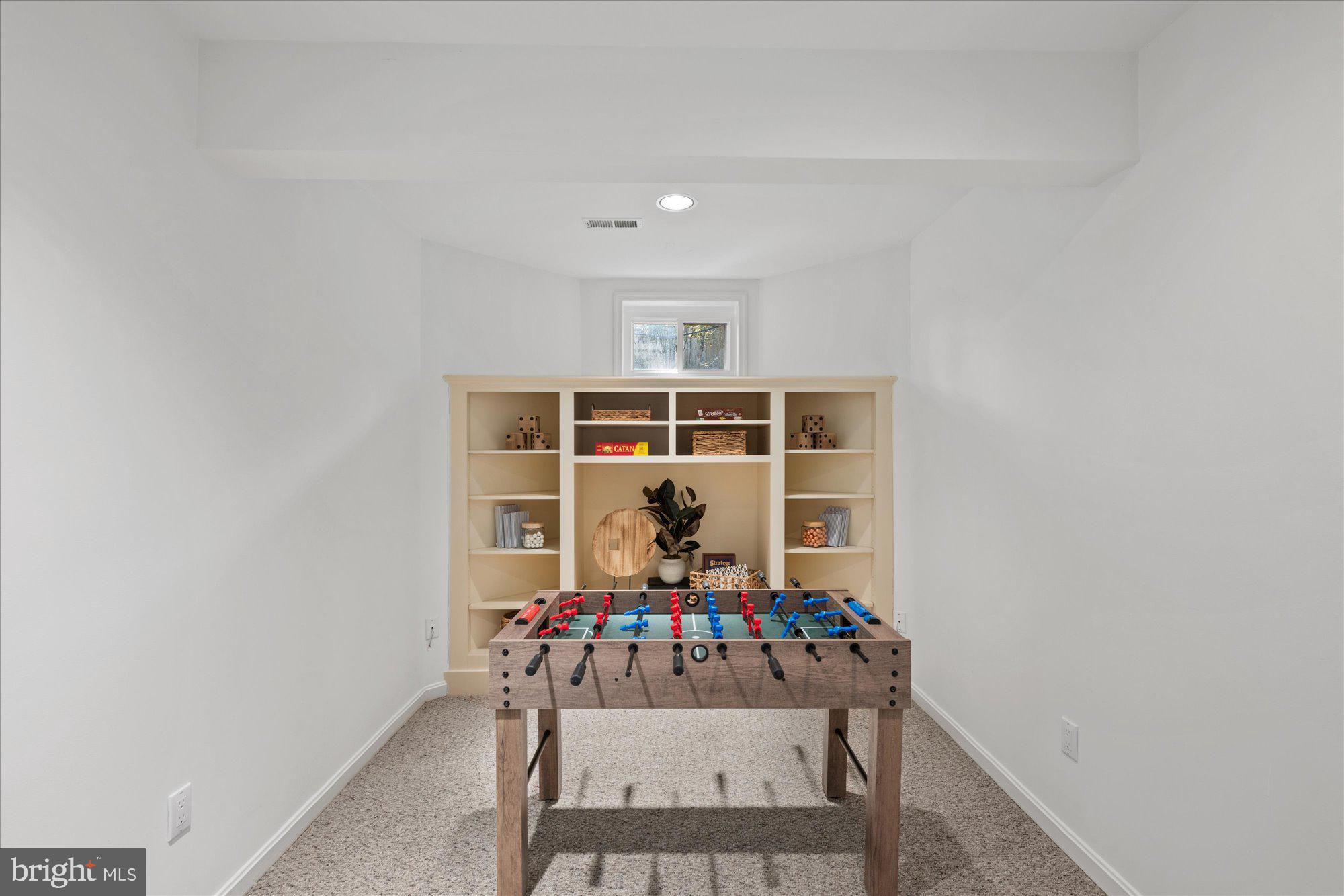 4332 Sangamore Road Bethesda, MD 20816 - Photo 25 of 28 Bright and inviting game room space.