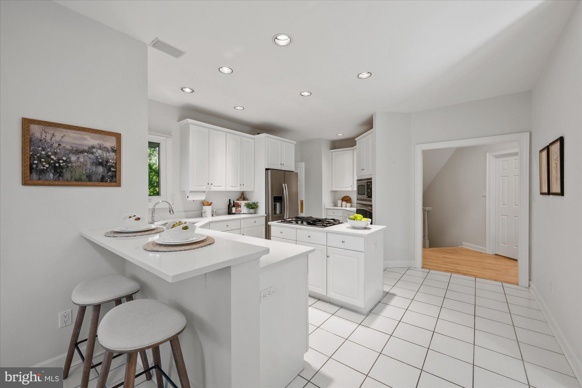 4332 Sangamore Road Bethesda, MD 20816 - Photo 10 of 28 Bright and airy modern kitchen space.