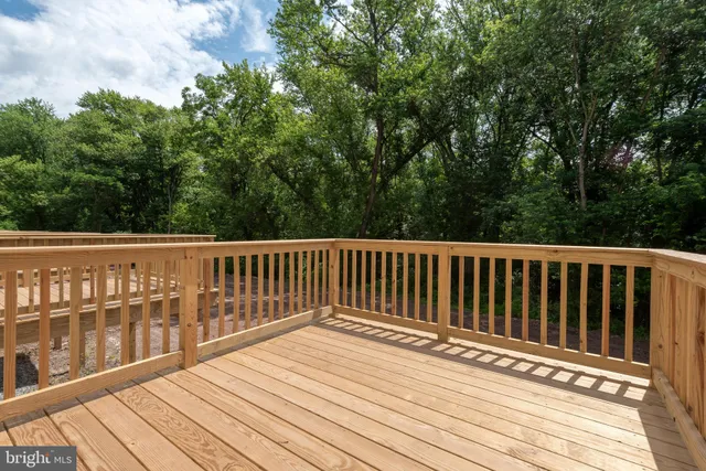 a view of a wooden roof deck