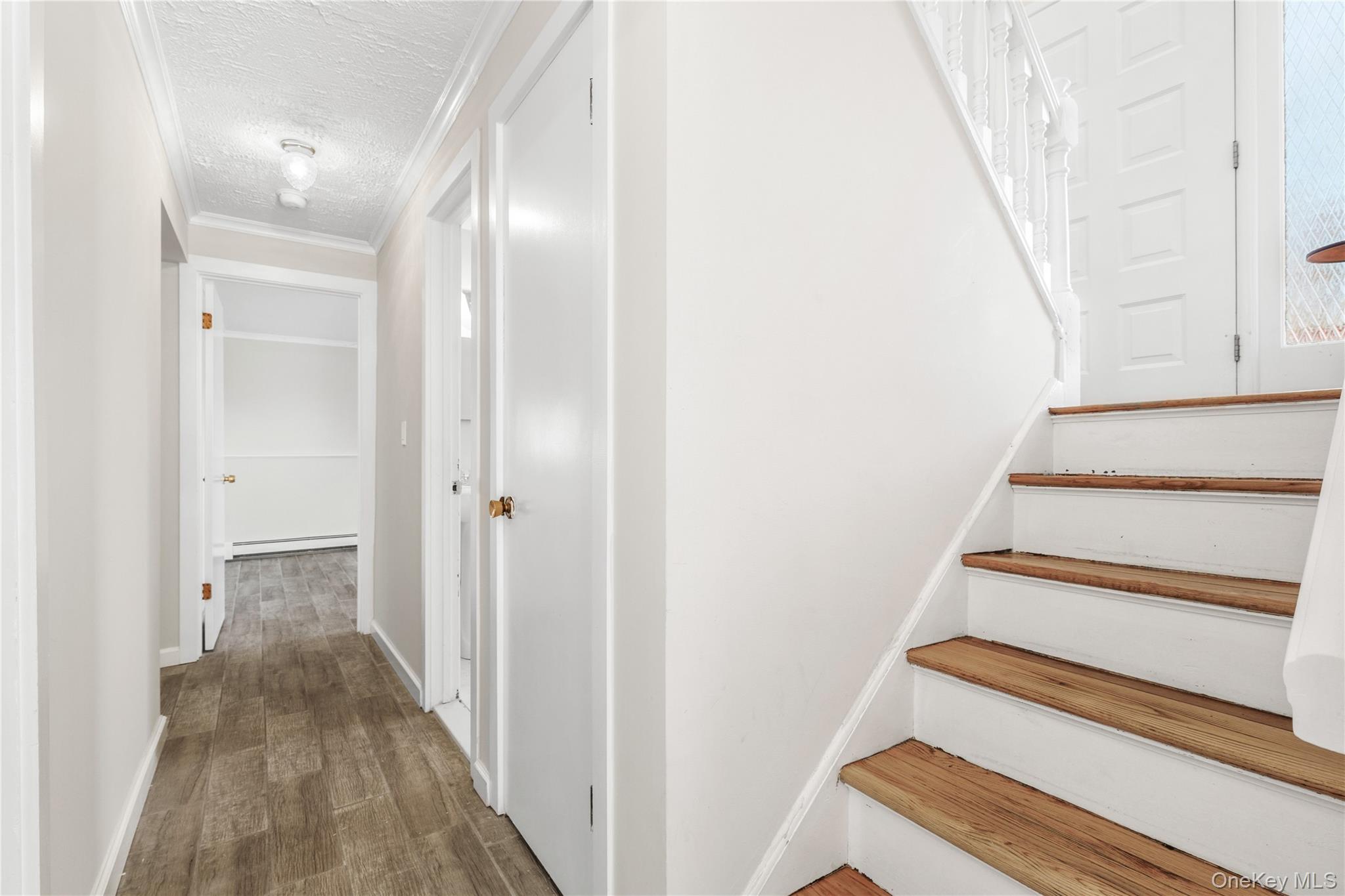 610 Granite Springs Road Yorktown Heights, NY 10598 - Photo 20 of 34 a view of a hallway with wooden floor and entryway