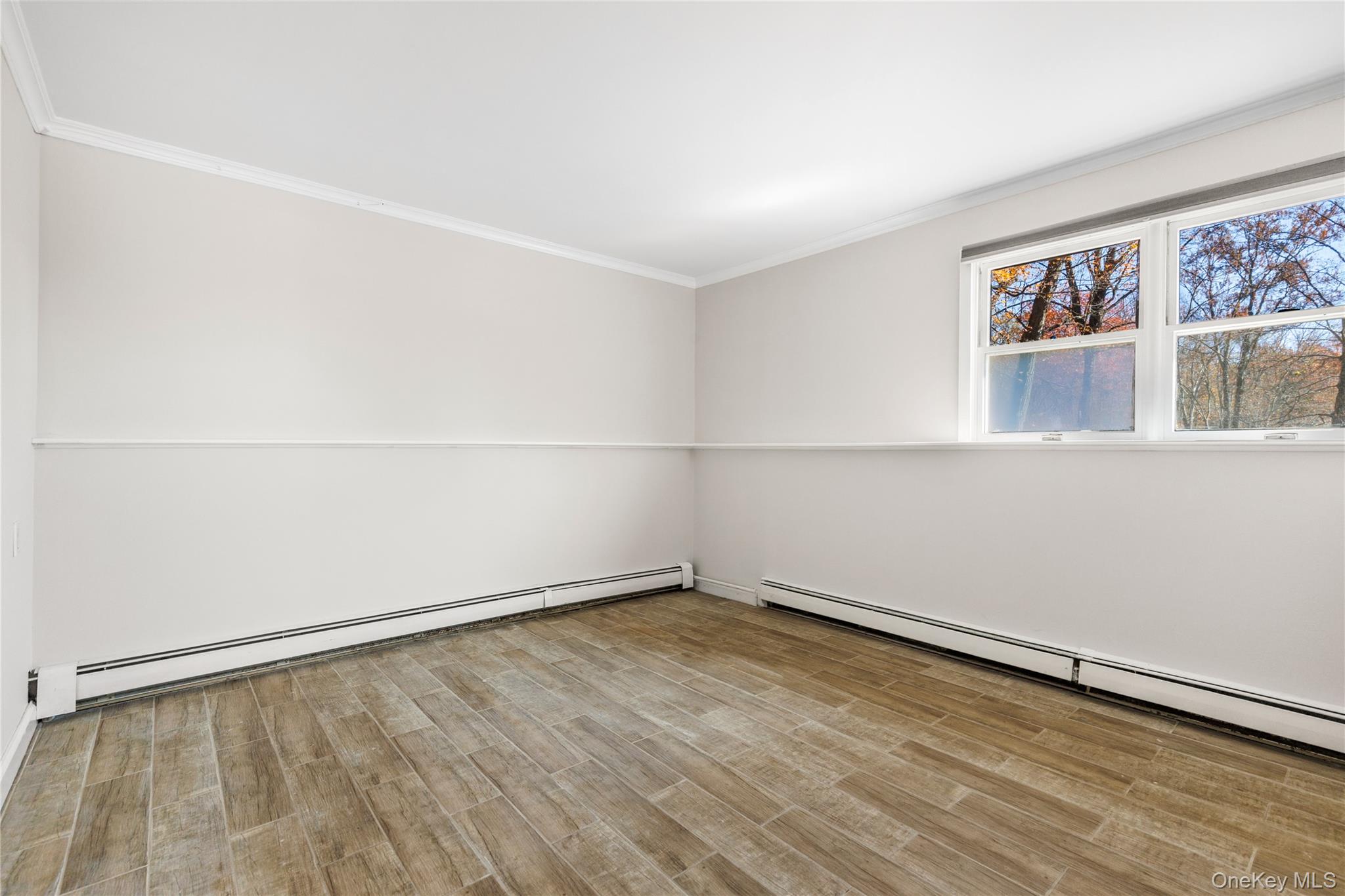 610 Granite Springs Road Yorktown Heights, NY 10598 - Photo 21 of 34 an empty room with a empty space and window