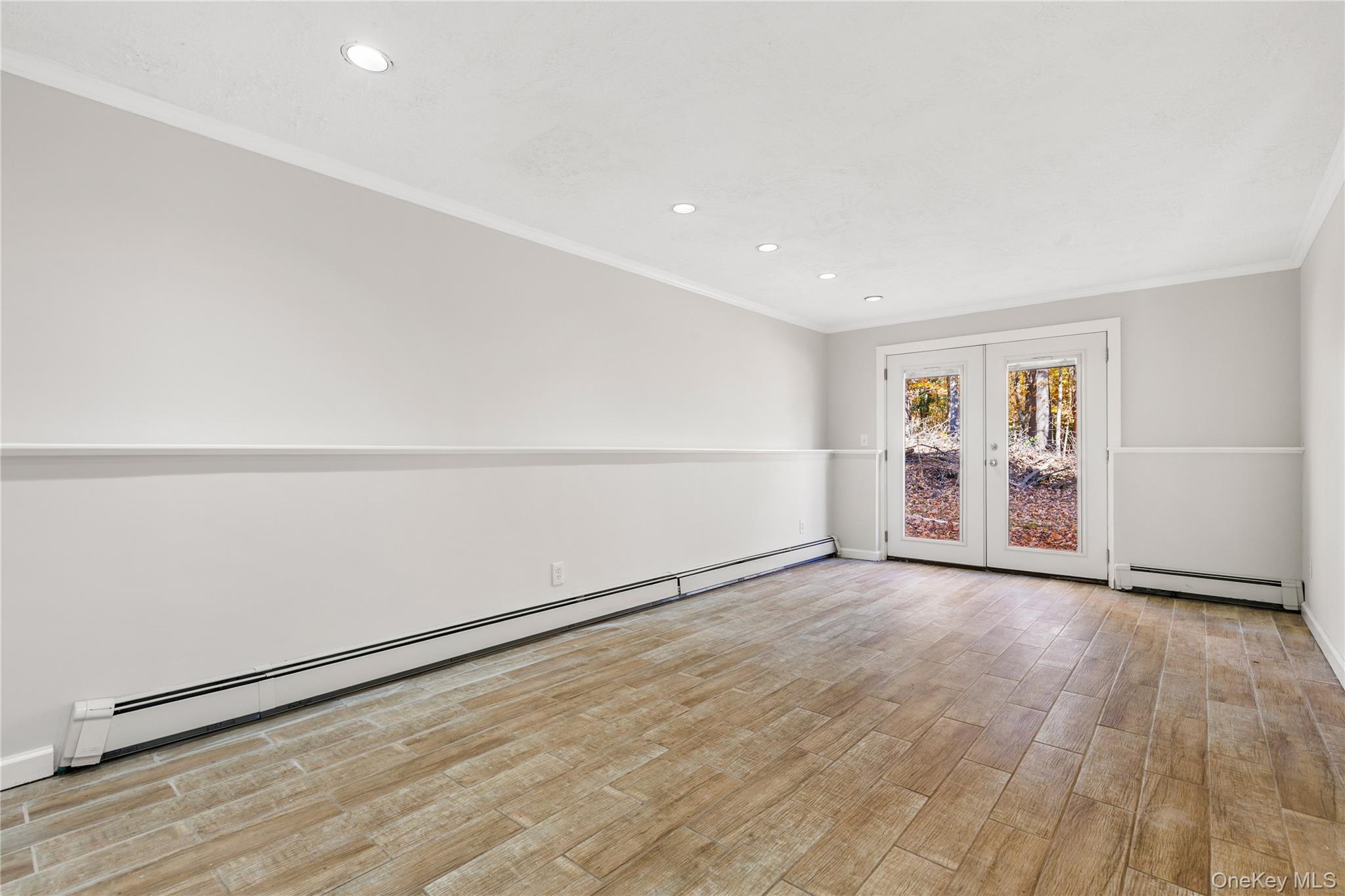 610 Granite Springs Road Yorktown Heights, NY 10598 - Photo 23 of 34 a view of an empty room with wooden floor