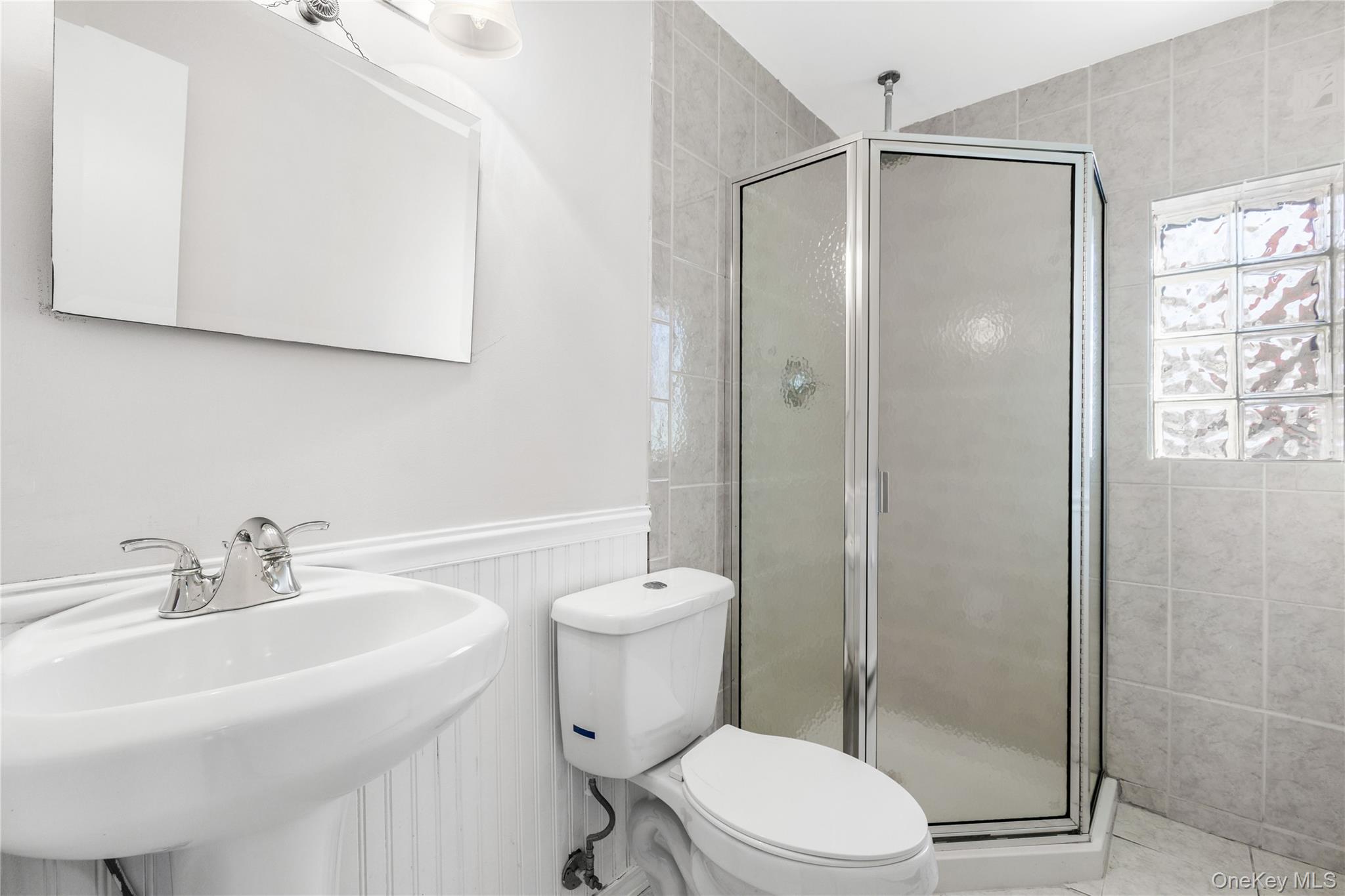 610 Granite Springs Road Yorktown Heights, NY 10598 - Photo 25 of 34 a bathroom with a sink toilet and shower