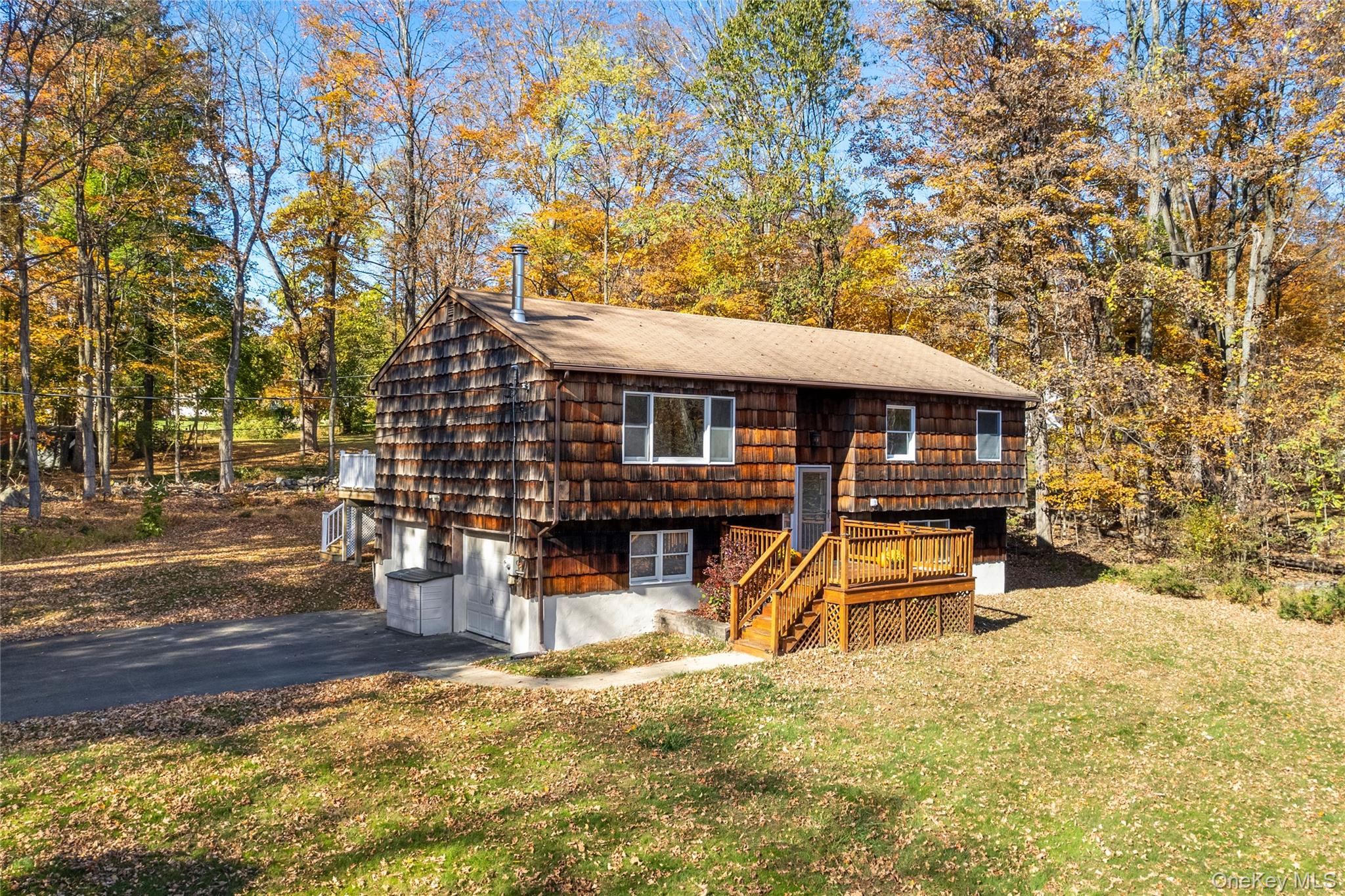 610 Granite Springs Road Yorktown Heights, NY 10598 - Photo 32 of 34 a view of a house with a yard