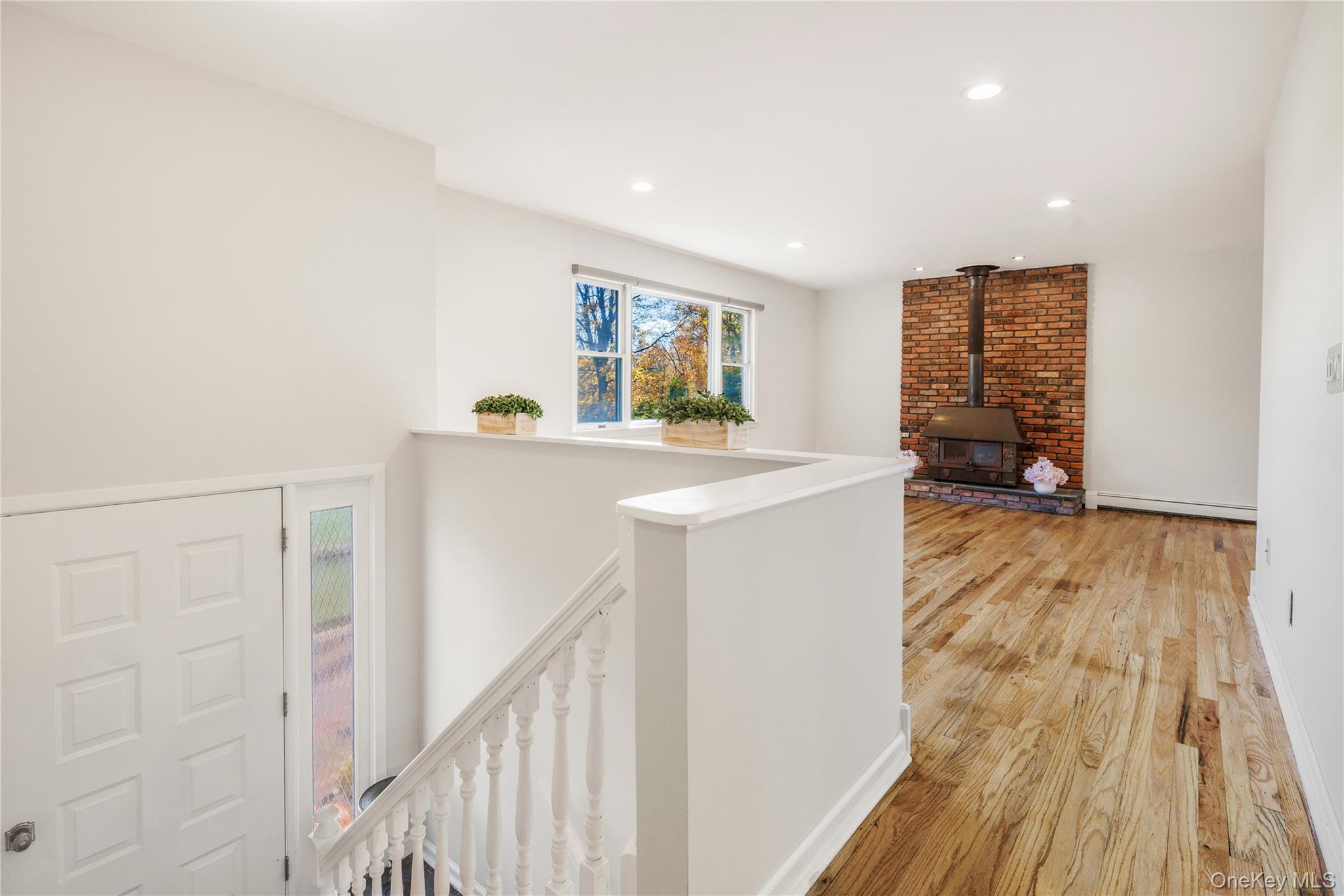 610 Granite Springs Road Yorktown Heights, NY 10598 - Photo 5 of 34 a view of empty room with wooden floor and fan