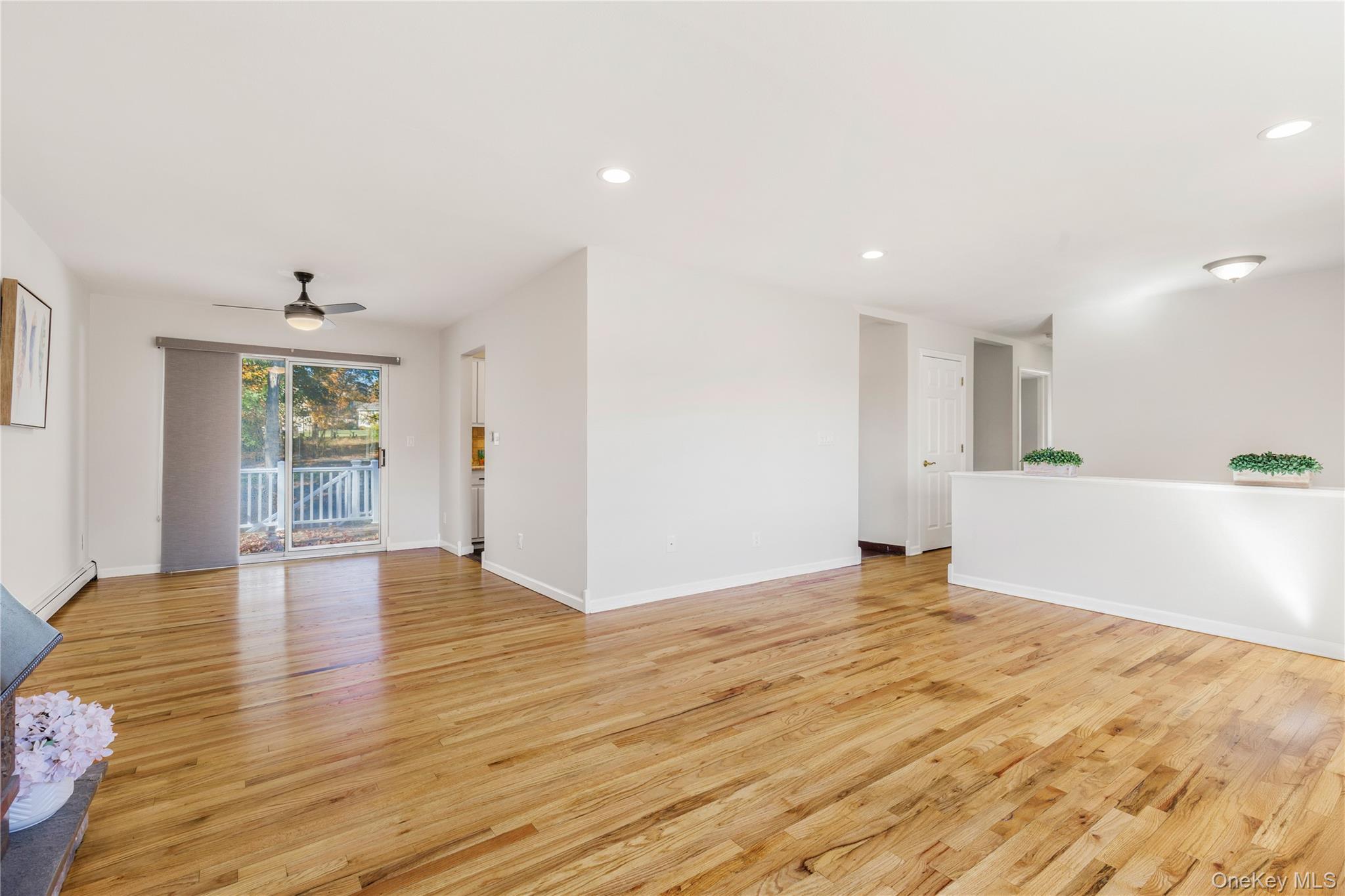 610 Granite Springs Road Yorktown Heights, NY 10598 - Photo 6 of 34 a view of an empty room with wooden floor and a window