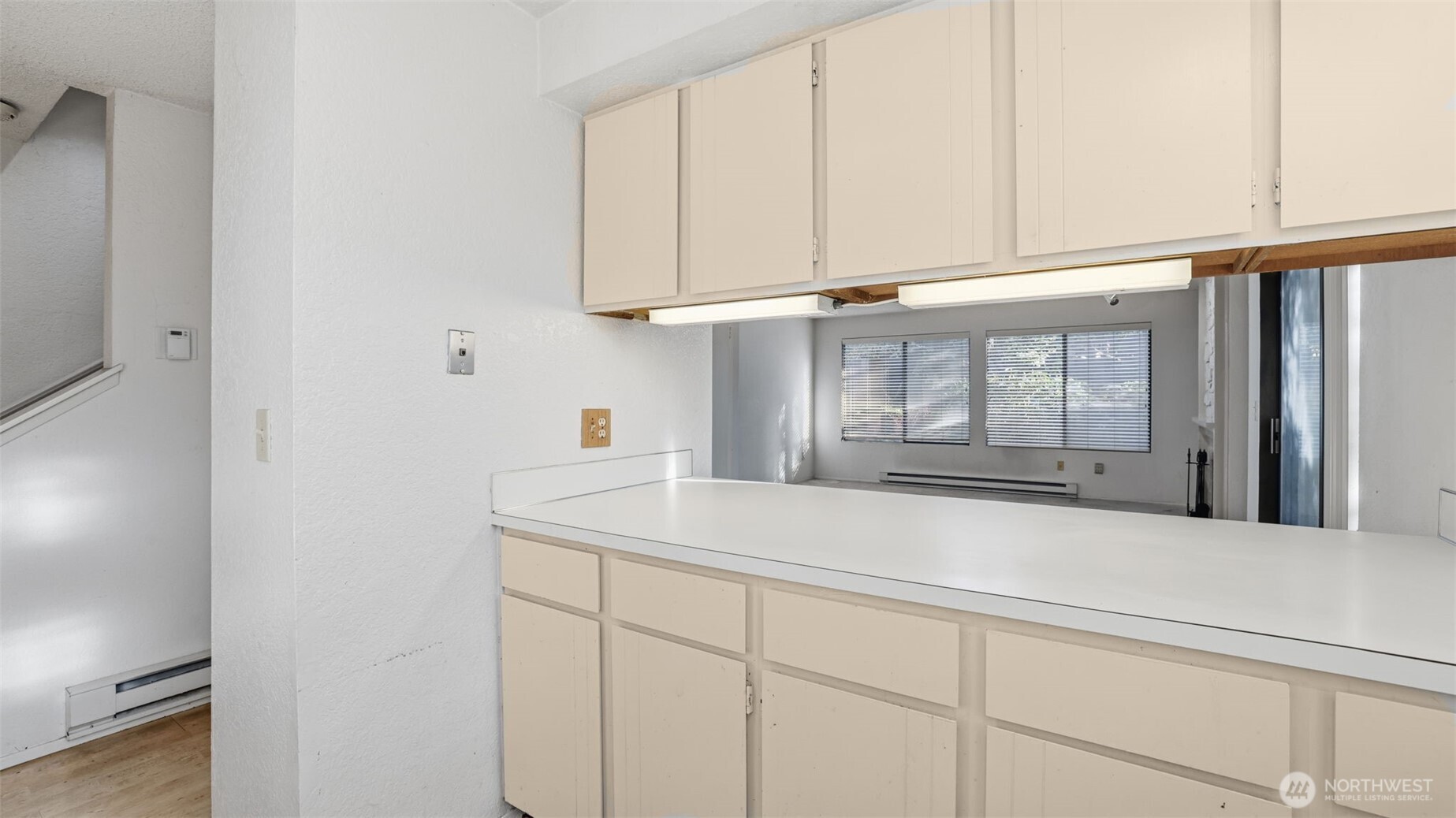 1850 Grant Avenue South, Unit D5 Renton, WA 98055 - Photo 14 of 25 a kitchen with a sink and cabinets