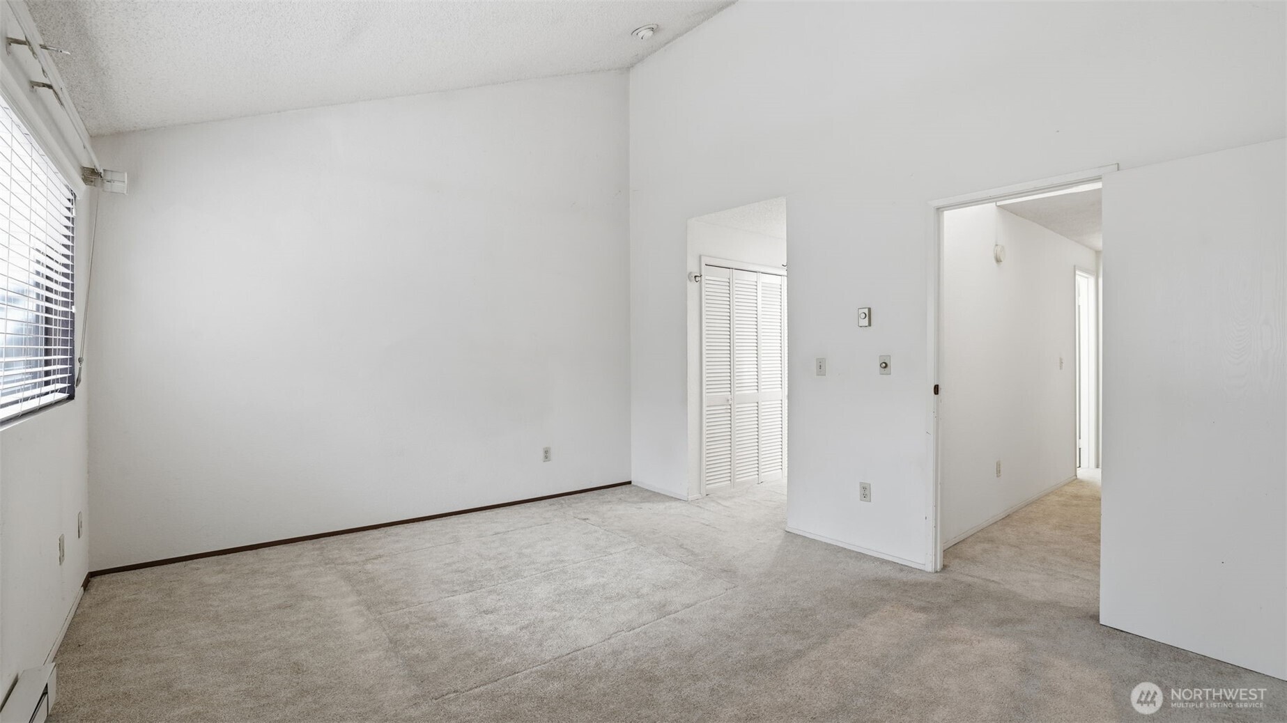 1850 Grant Avenue South, Unit D5 Renton, WA 98055 - Photo 16 of 25 an empty room with a empty space and a window