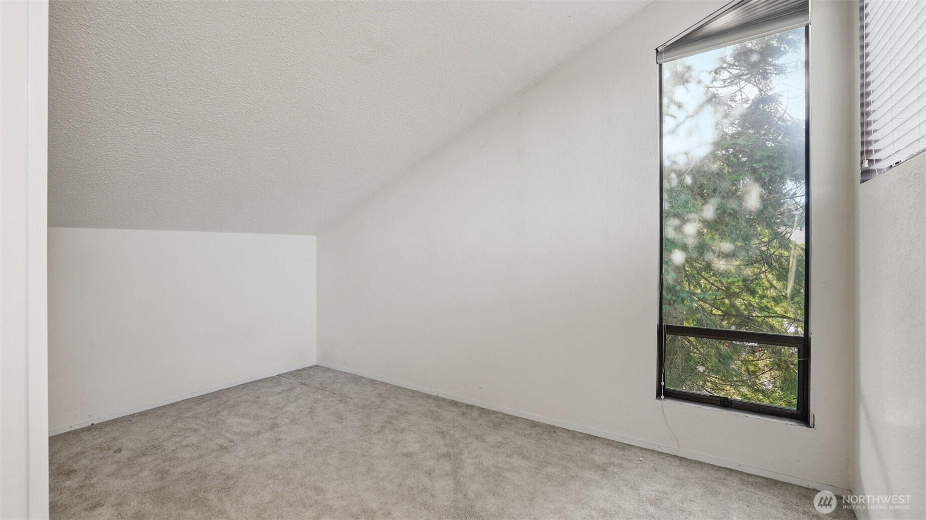 1850 Grant Avenue South, Unit D5 Renton, WA 98055 - Photo 22 of 25 a view of a small space with a window