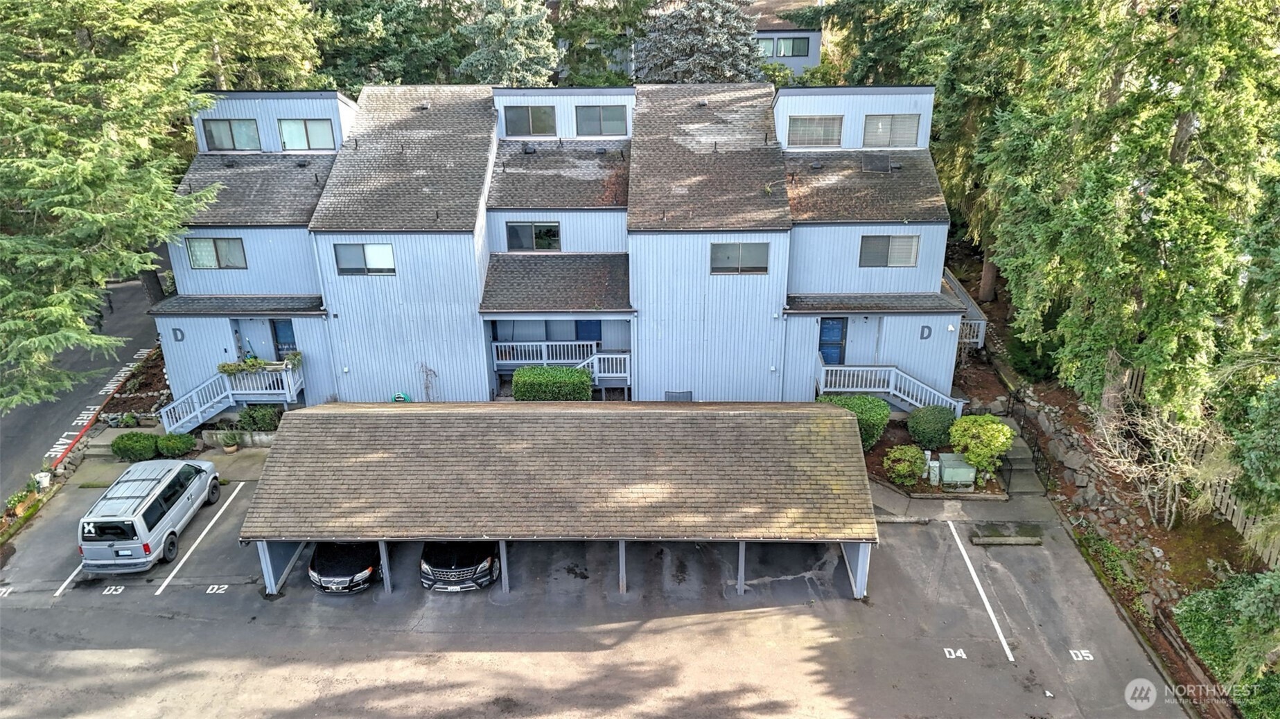 1850 Grant Avenue South, Unit D5 Renton, WA 98055 - Photo 3 of 25 aerial view of a house with a swimming pool