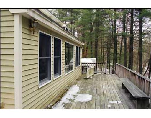 20 Axdell Road Sudbury, MA 01776 - Photo 17 of 17 a balcony with table and chairs