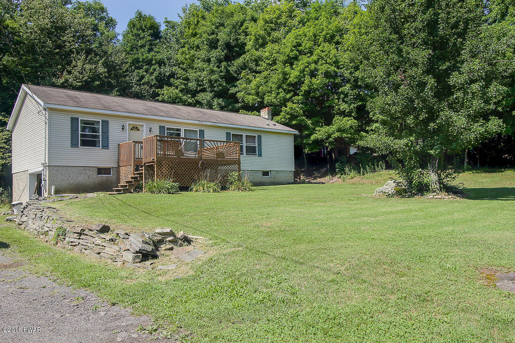 5630 Haas Pond Road Moscow, PA 18444 - Photo 34 of 42 a view of a house with a yard