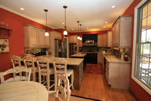 Gorgeous remodeled kitchen with gas Kitchenaid cooktop and double ovens