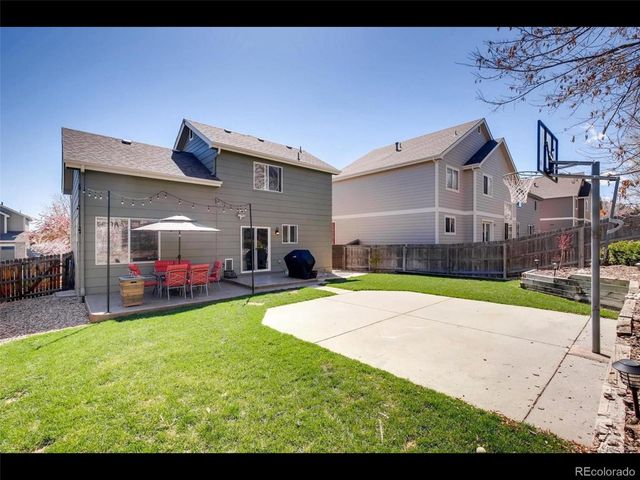 a view of a house with swimming pool