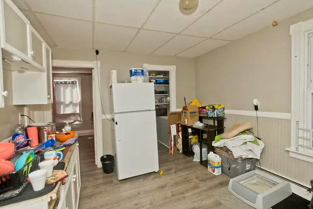 a storage room with furniture and a window