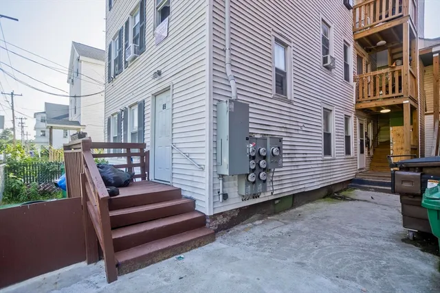 a view of a patio with couches chairs and potted plants