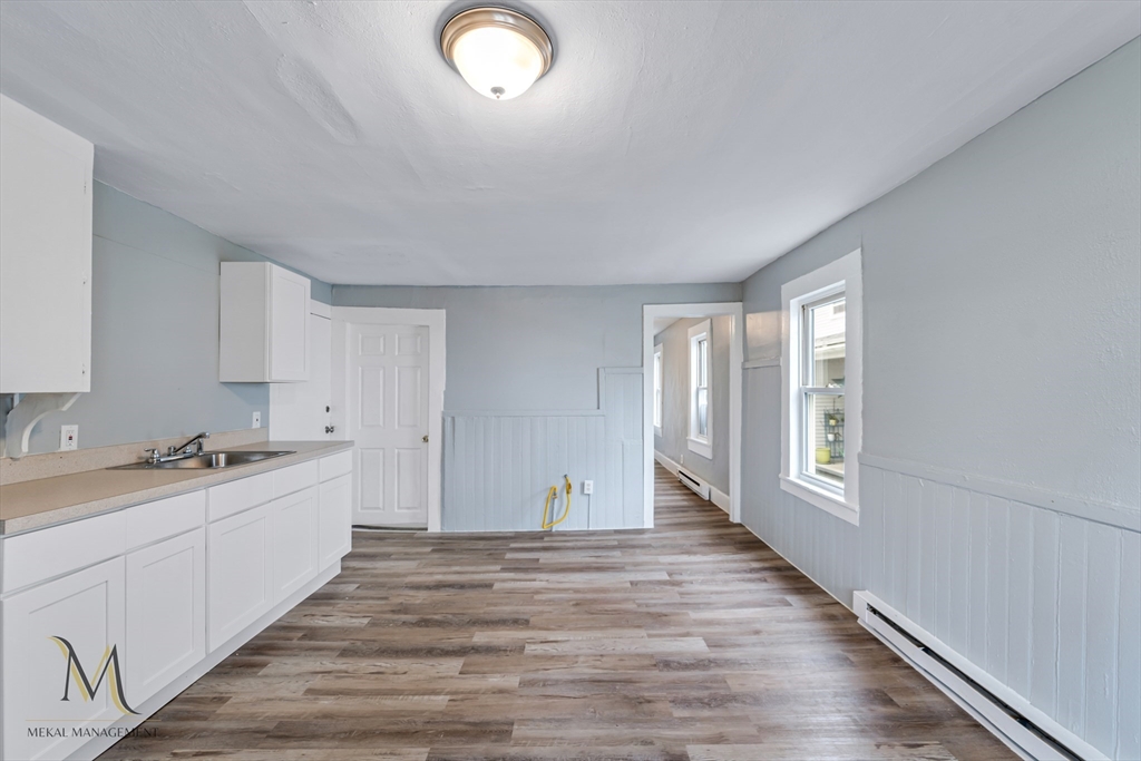 89-95 School Street Chicopee, MA 01013 - Photo 6 of 39 a room with a sink and a window