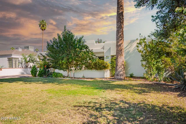 a view of swimming pool yard and lake