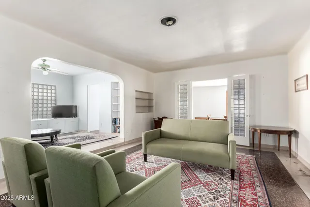 a living room with furniture and a couch