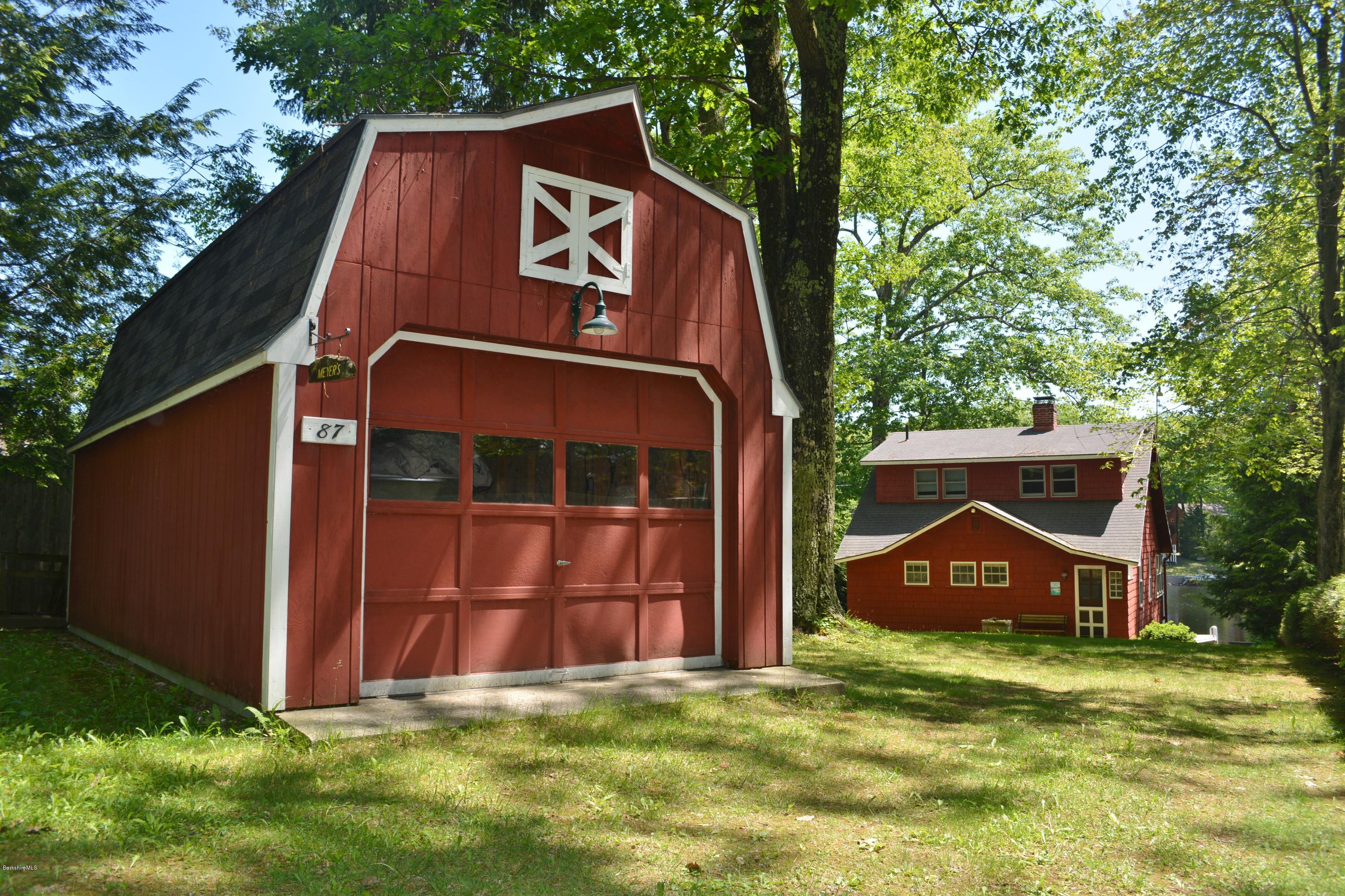 87 North Gate Island Road Otis, MA 01029 - Photo 4 of 15 a sign on the side of a building