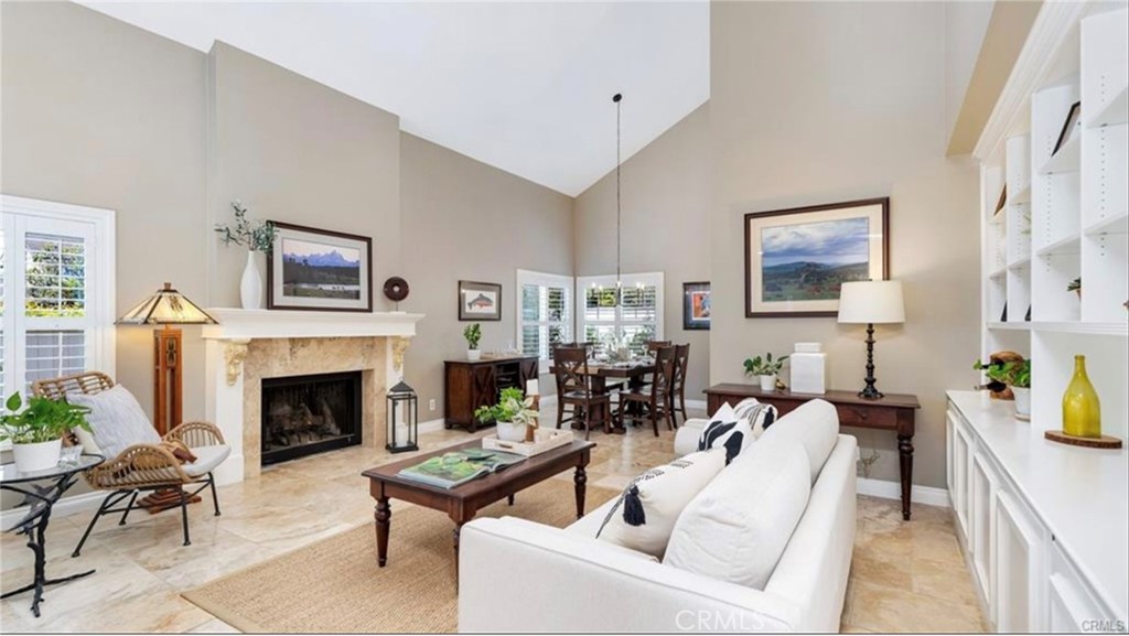 8 Oakgrove, Unit 54 Irvine, CA 92604 - Photo 3 of 14 a living room with furniture fireplace and window