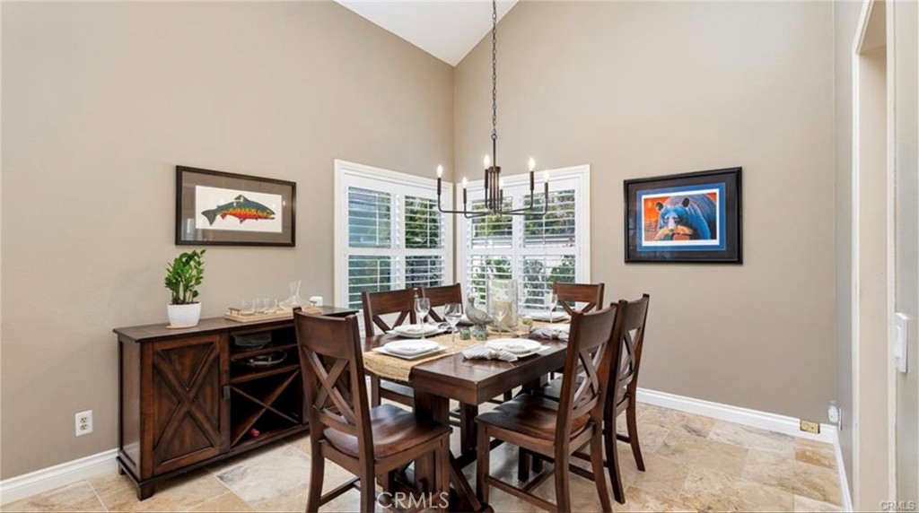 8 Oakgrove, Unit 54 Irvine, CA 92604 - Photo 5 of 14 a view of a dining room with furniture window and wooden floor
