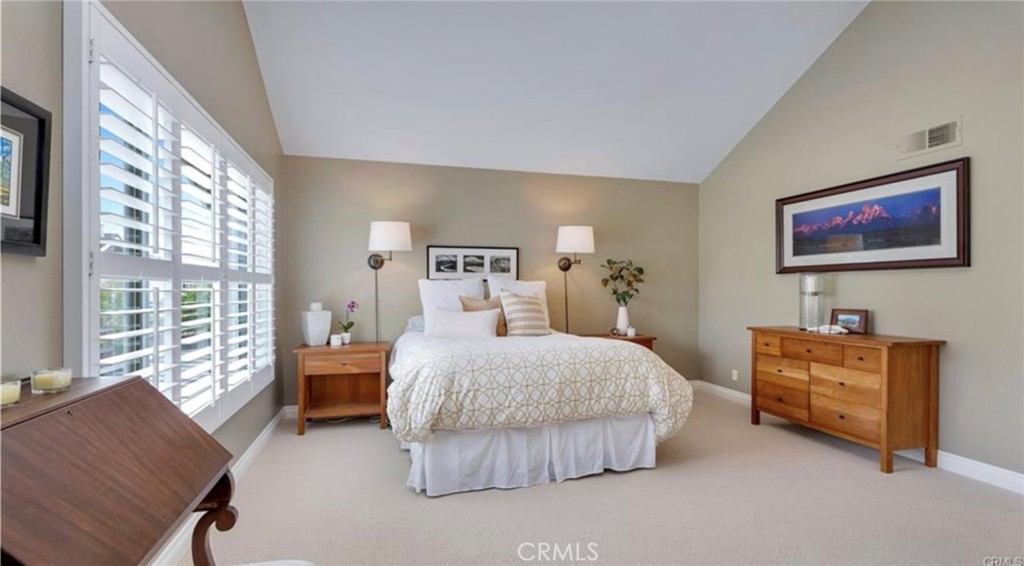 8 Oakgrove, Unit 54 Irvine, CA 92604 - Photo 10 of 14 a bedroom with bed and window