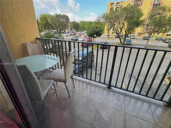 a view of balcony with furniture