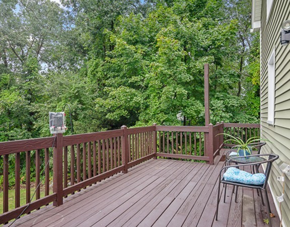80 Hillcrest Road Waltham, MA 02451 - Photo 12 of 20 a view of balcony with wooden floor and outdoor seating