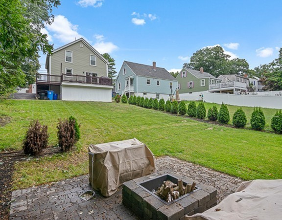 80 Hillcrest Road Waltham, MA 02451 - Photo 14 of 20 a view of a house with backyard and a garden