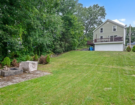 80 Hillcrest Road Waltham, MA 02451 - Photo 15 of 20 a view of a house with a yard and sitting area