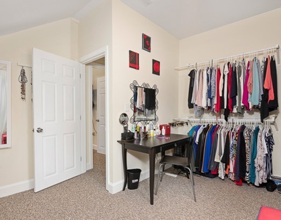 80 Hillcrest Road Waltham, MA 02451 - Photo 10 of 20 a view of a room with clothes and shoes