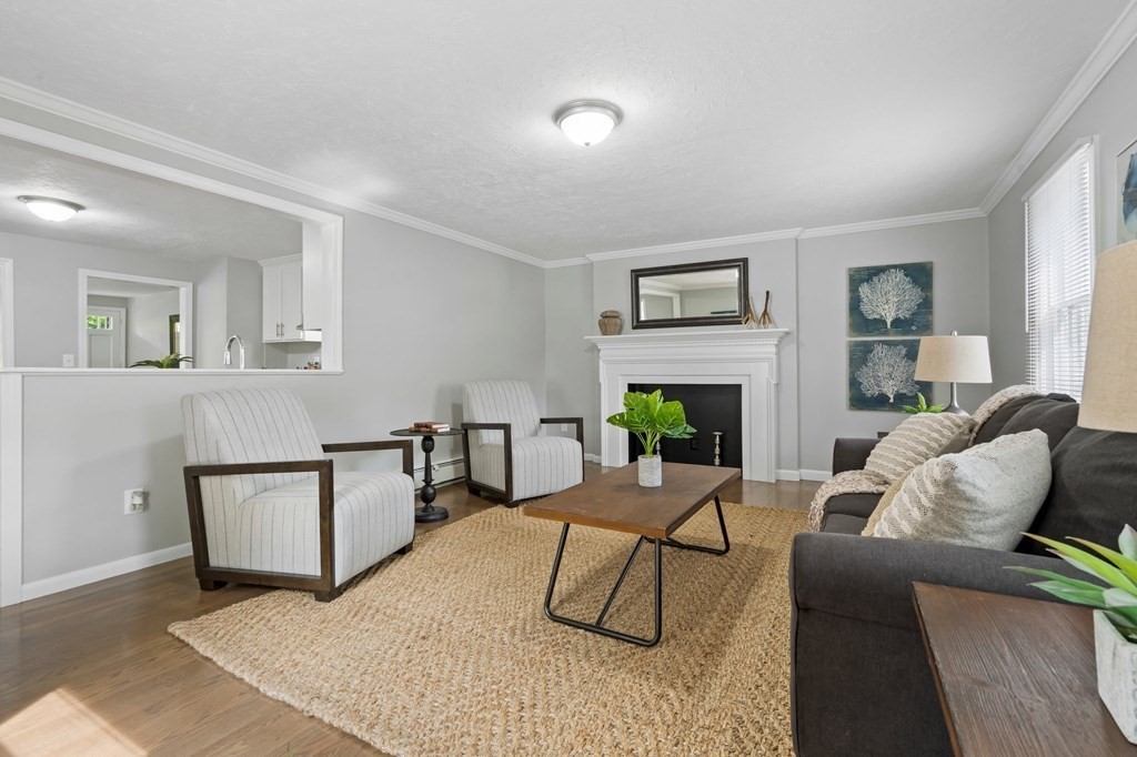 6 Glen Road Peabody, MA 01960 - Photo 12 of 35 a living room with furniture and a wooden floor