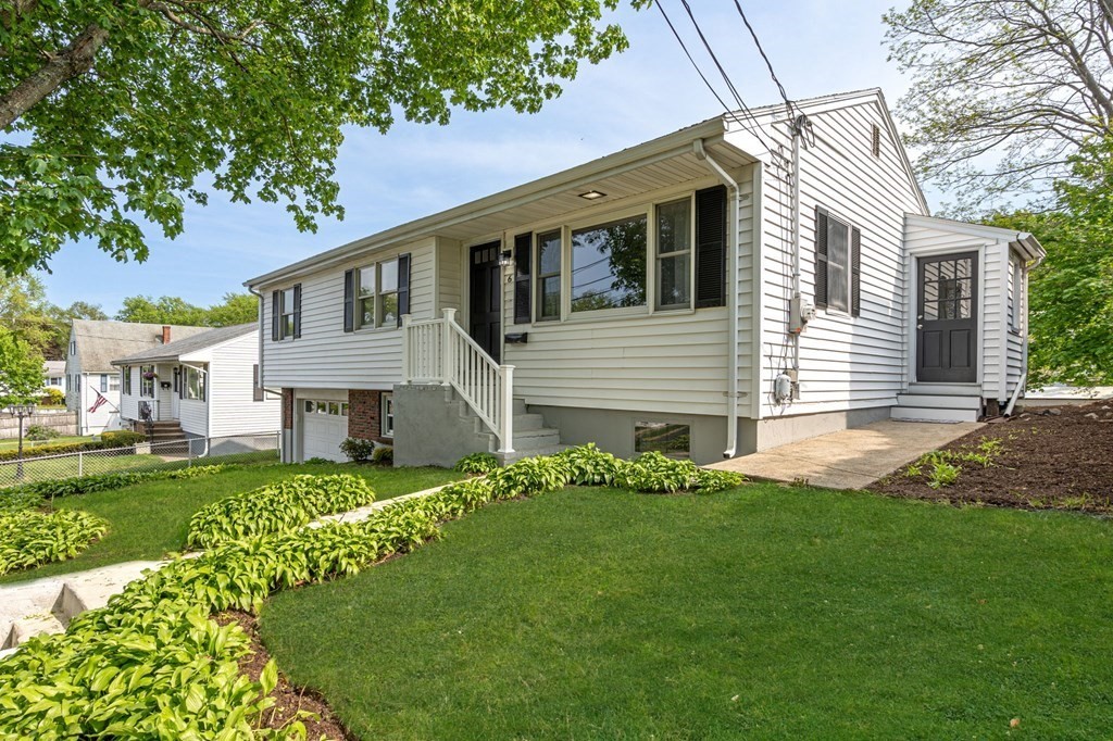 6 Glen Road Peabody, MA 01960 - Photo 2 of 35 a front view of a house with a yard