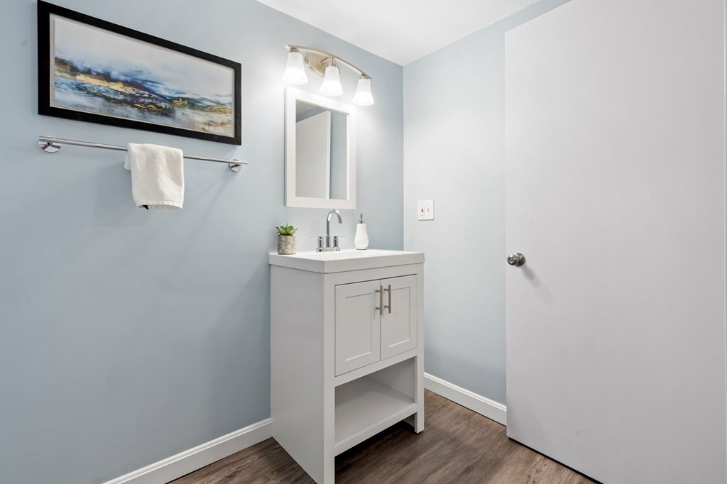 6 Glen Road Peabody, MA 01960 - Photo 21 of 35 a bathroom with a sink and a mirror