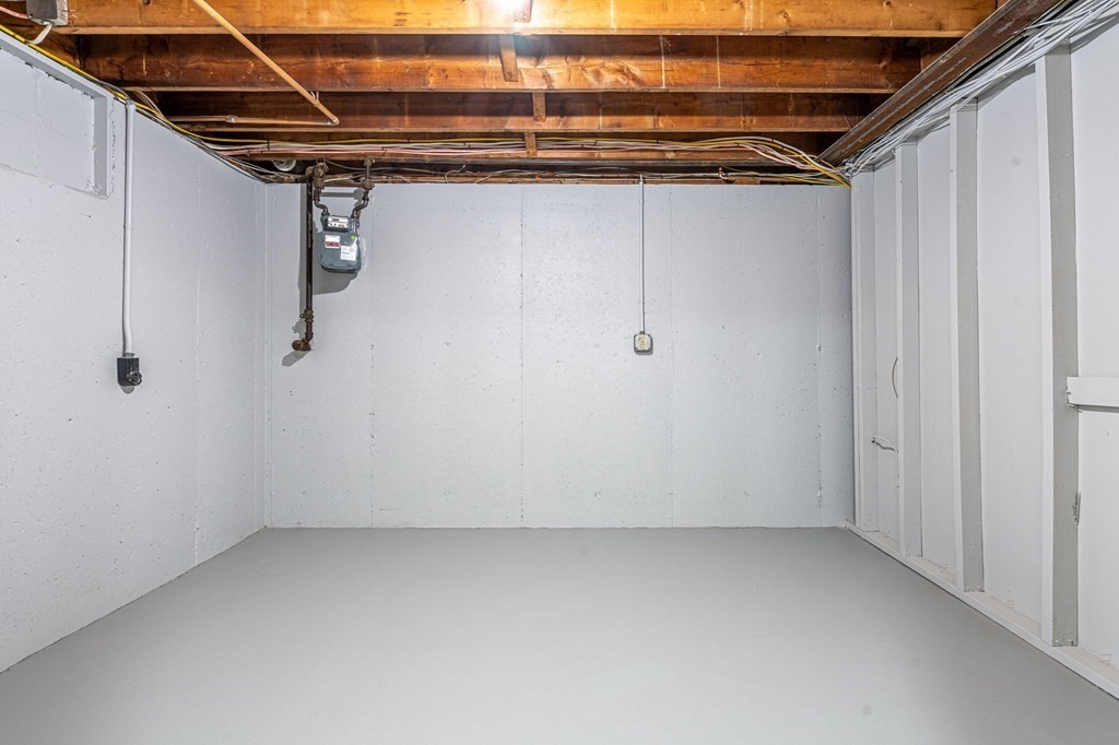 6 Glen Road Peabody, MA 01960 - Photo 27 of 35 a view of a room with racks on the wall