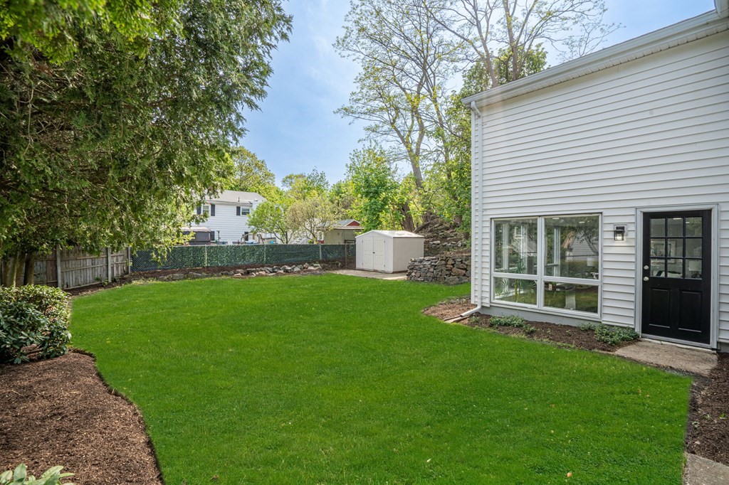 6 Glen Road Peabody, MA 01960 - Photo 29 of 35 front view of a house with a yard